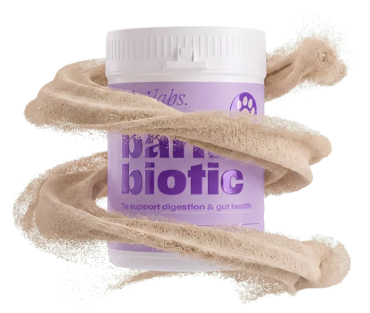 A tub of Bark Biotic surrounded by a swirl of its powder